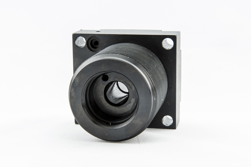 CNC machined link clamp with circular pocket and bolt pattern